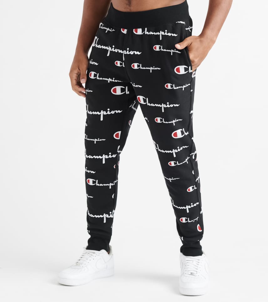 champion all over logo joggers